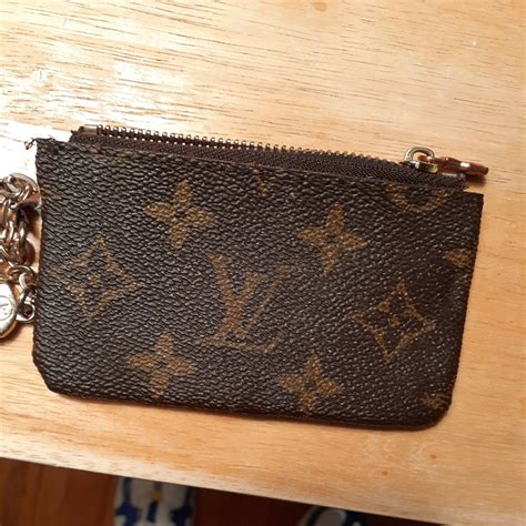 louis vuitton change purse price.